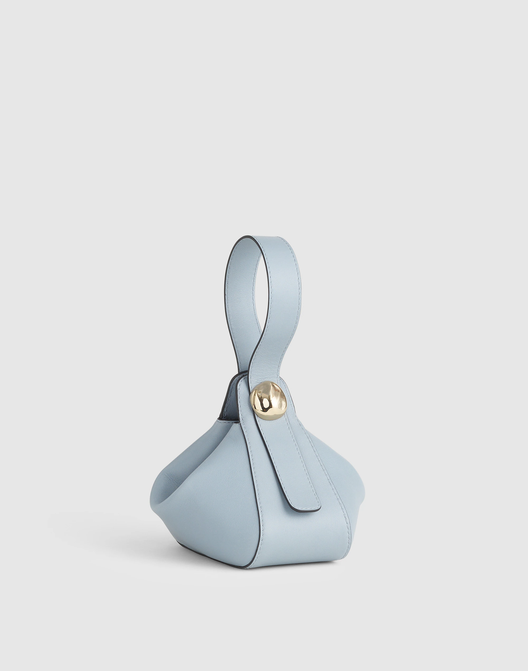 The Sculpted Metal Wristlet Bag