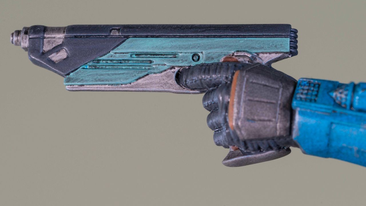 A close-up of a blaster on the Bo-Katan Kryze 1:6 scale Mini Bust
