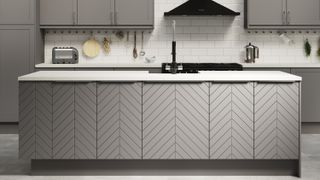 Grey magnet kitchen with wall and chevron base cabinets