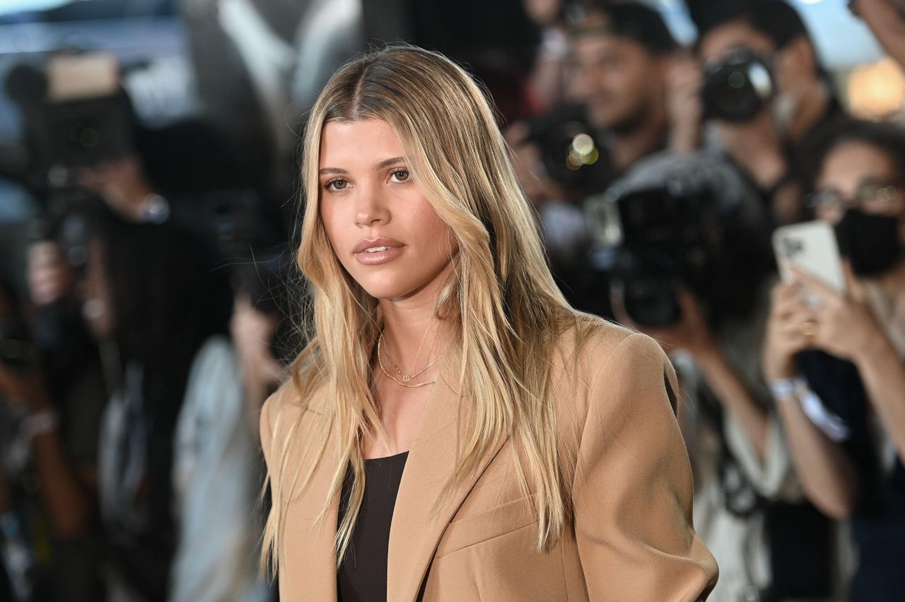 sofia richie at the michael kors show in a beige suit 