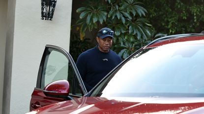 Tiger Woods heading into a car after withdrawing from the 2024 Genesis Invitational