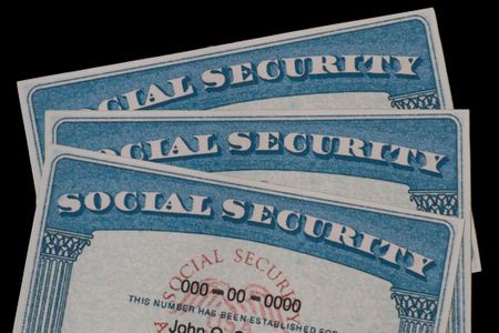 Lake Elsinore, CA, USA - March 12, 2025: Close up of a stack of SSN cards.