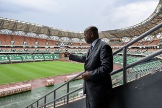 Ivorian football federation president Yacine Idriss Diallo speaks in the stands of the Alassane Ouattara Olympic stadium, one of the venues for the AFCON 2023, in December 2023.