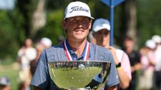 Noah MacLauchlan with the US Junior Amateur trophy 