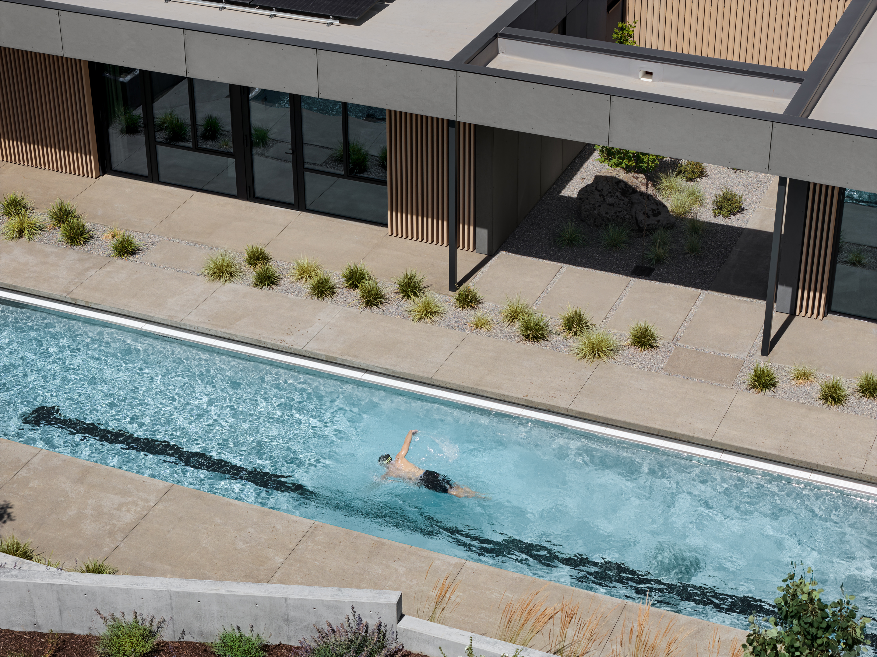 Image of an Oregon house, the Bend Hideaway, a linear modern home among trees and open to nature