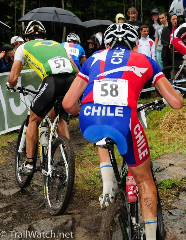 Riders file up the switchbacks as they contend with slick rocks