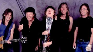 AC/DC posing for a photograph in the early 2000s