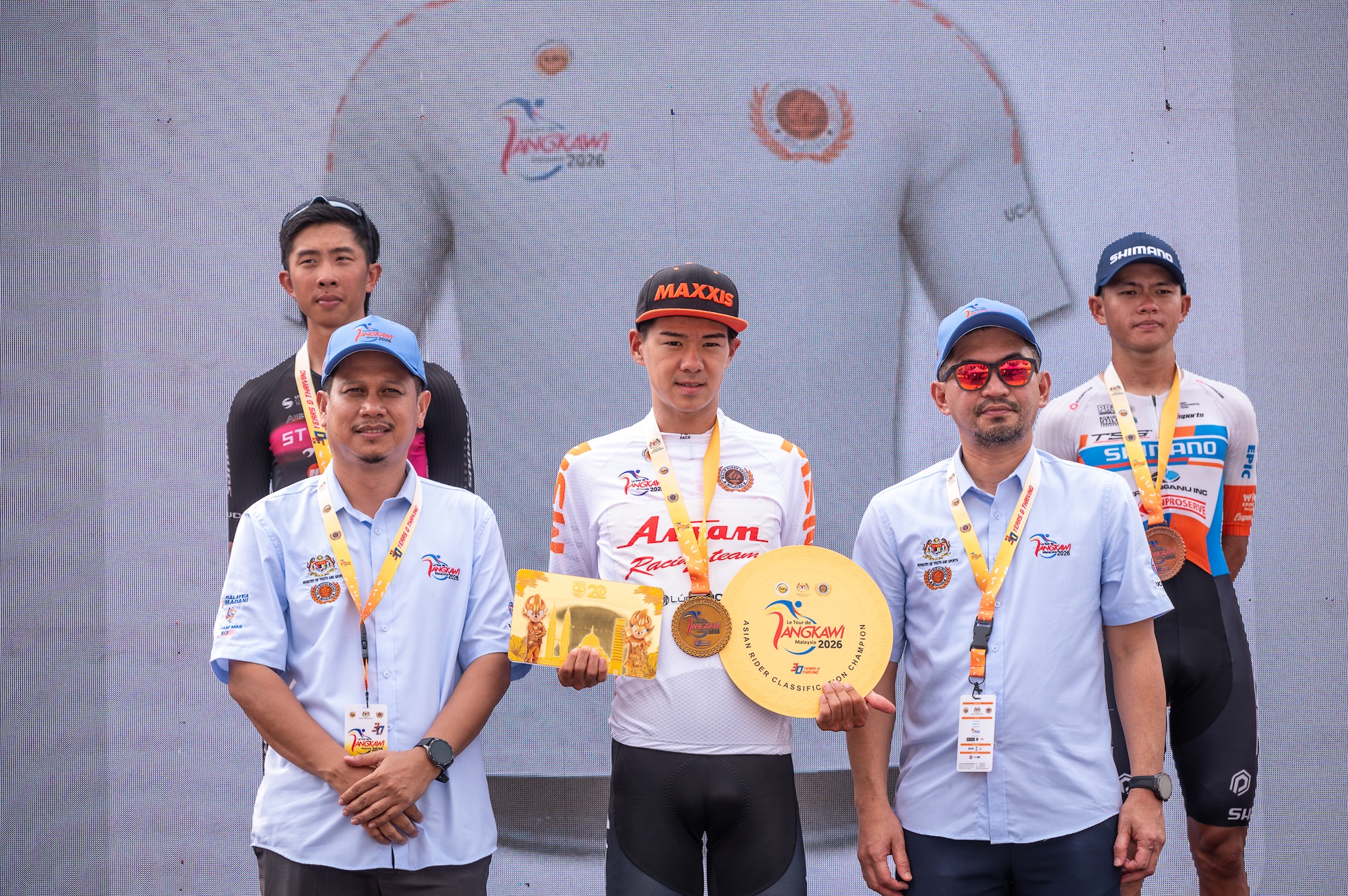 Asian rider classification podium with Yuhi Todome (Aisan Racing) first, Ren Bao Tsen (St George) second and Zhe Yie Kee (Terengganu) in third
