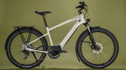 Specialized Turbo Vado 4.0 e-bike on an off yellow background