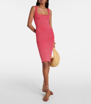 model wears striped minidress