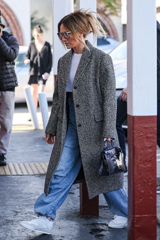 Jennifer Lopez goes christmas shopping in California wearing a wool coat and sneakers