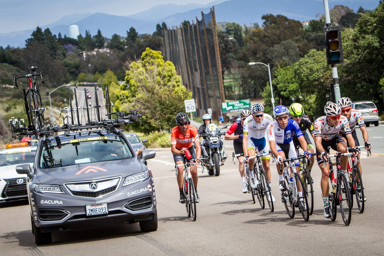 Danny Pate (Rally) goes to the team car for a water bottle