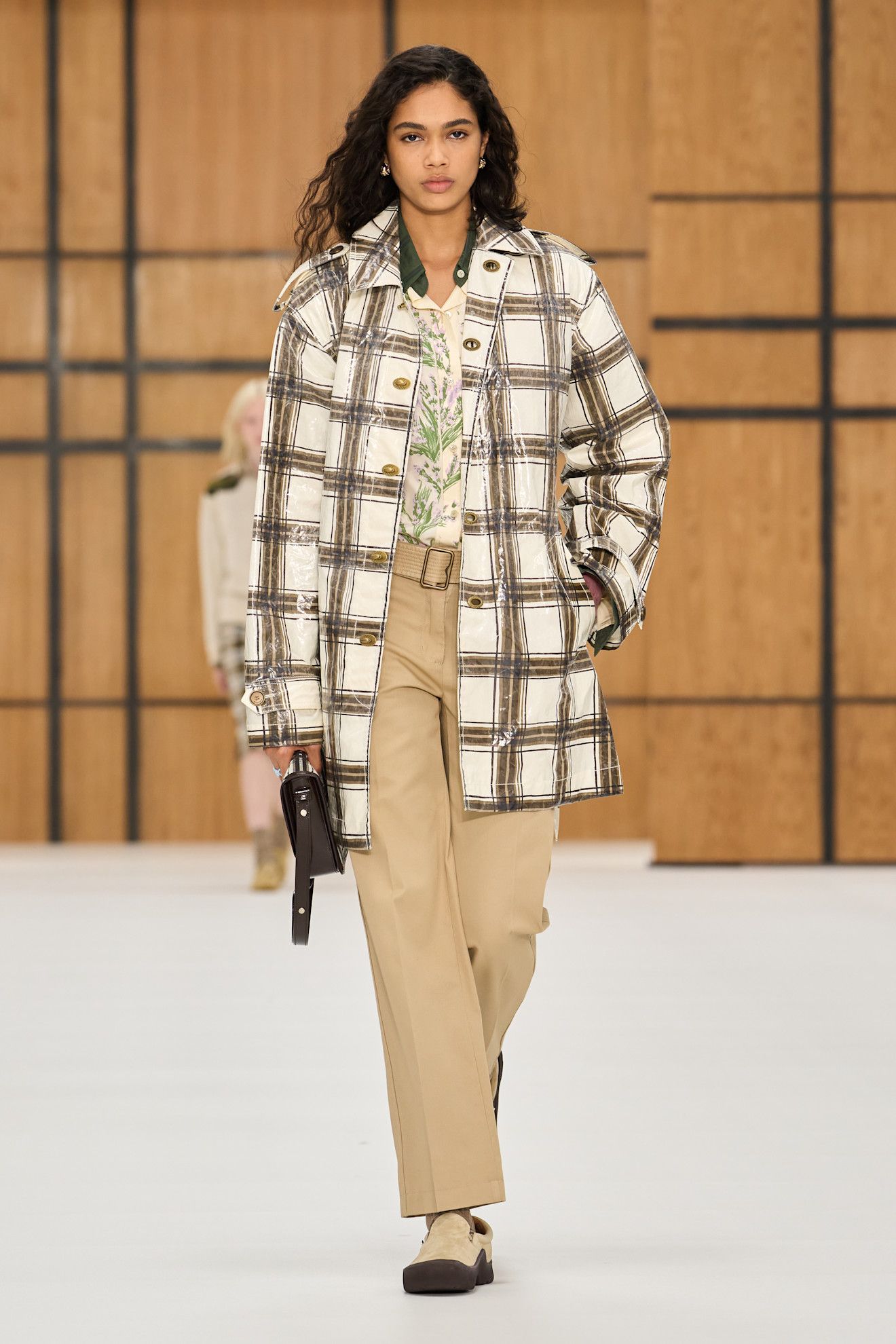 a model walks the burberry spring/summer 2027 runway.