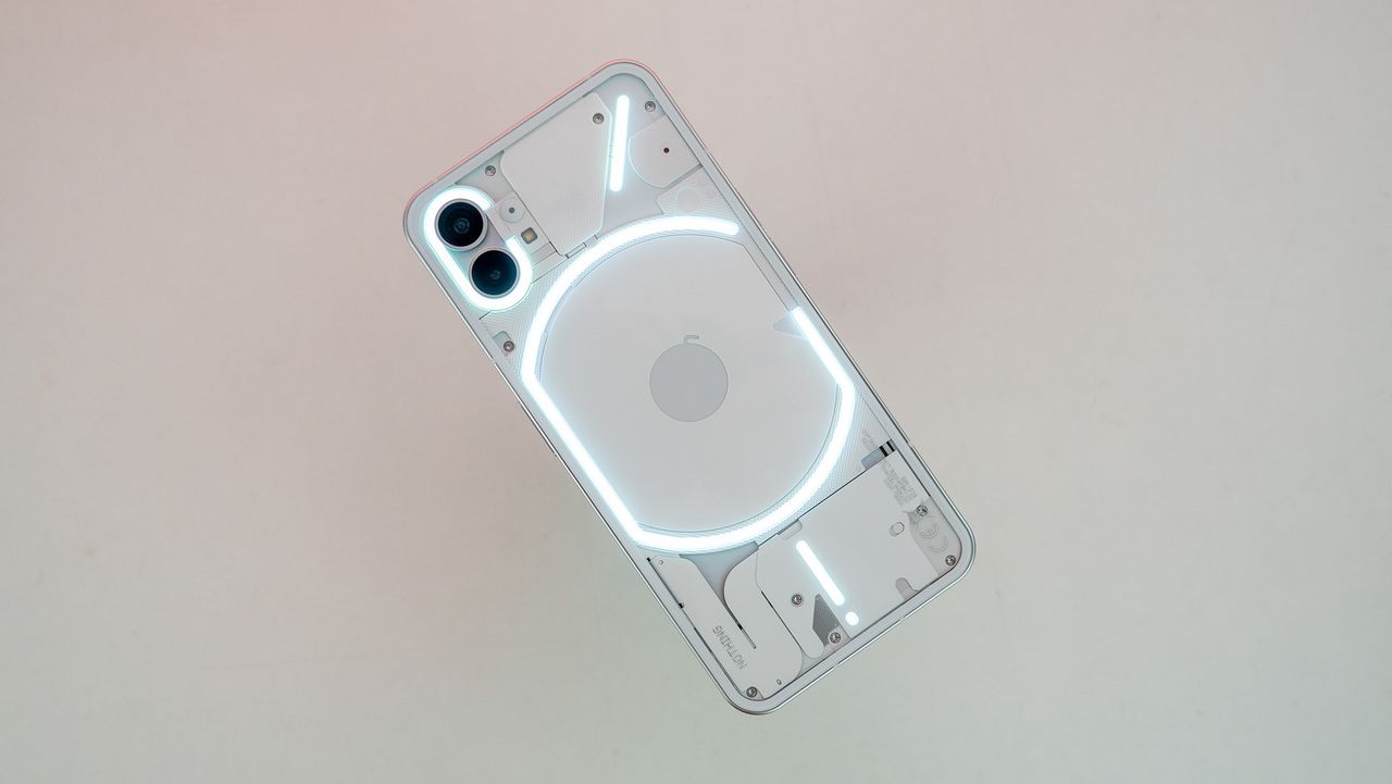 Nothing phone (1) with back-facing glyph LEDs illuminated