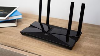 TP-Link Archer AX1500 on a wooden table