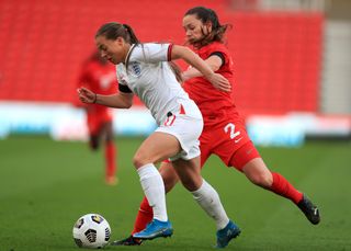 Fran Kirby (left) has not been included in Wiegman's 24-player squad (Mike Egerton/PA).
