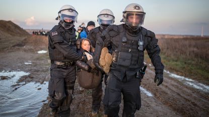 Police officers detain climate activist Greta Thunberg 