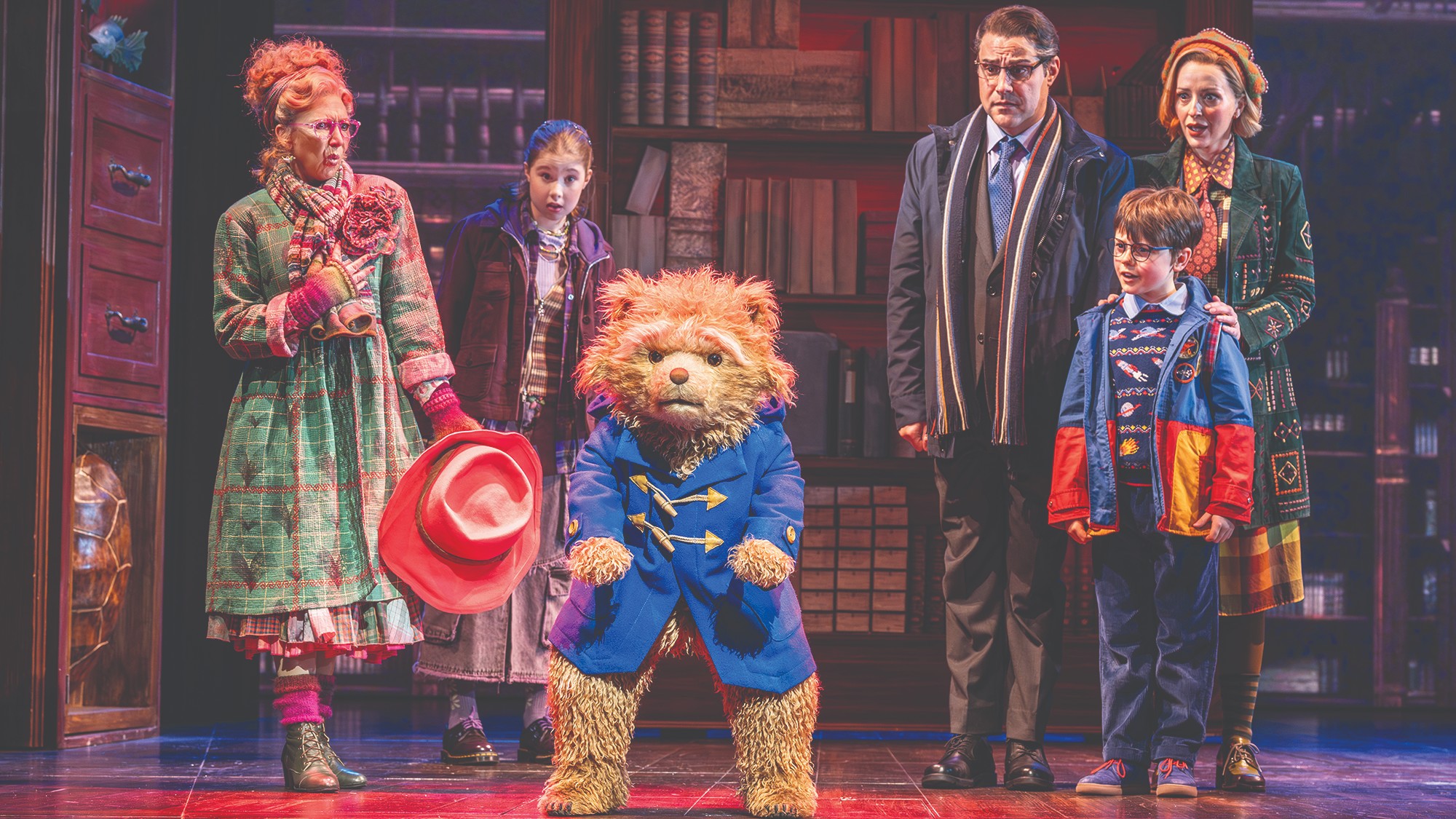 Paddington and the Browns on stage in a musical
