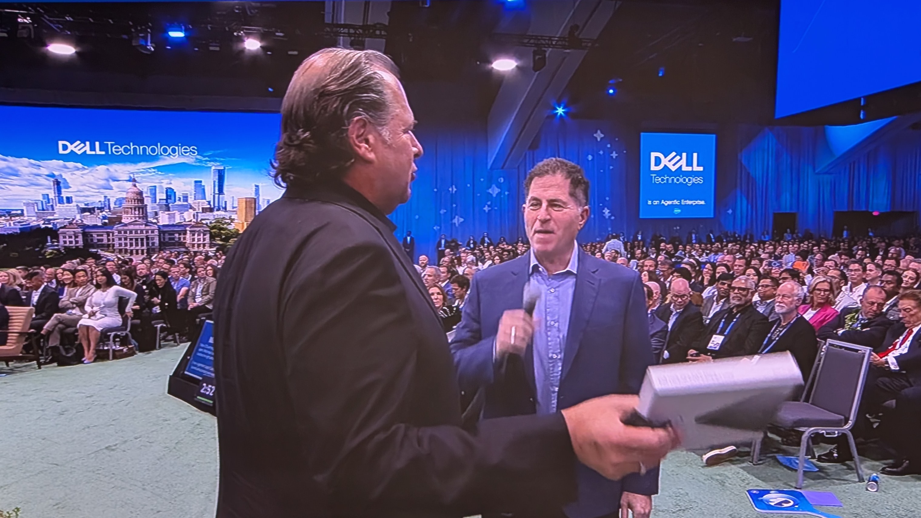 Michael Dell speaking to Marc Benioff at the Dreamforce 2025 opening keynote.