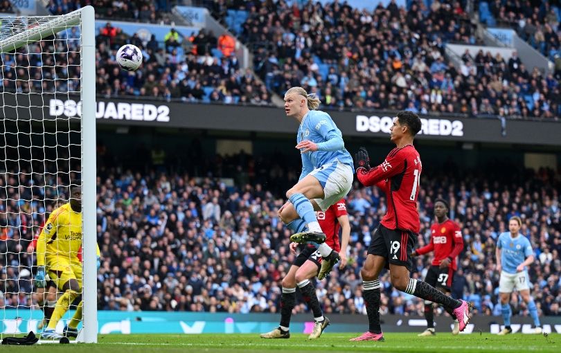 Erling Haaland sends the ball over the bar from close range against Manchester United