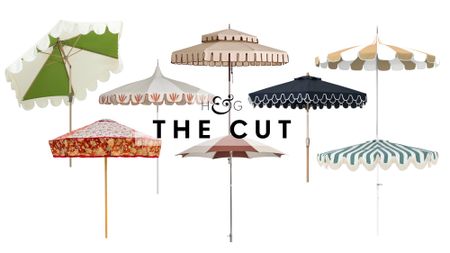 Outdoor umbrellas, featuring styles including details such as fringe, scallops, stripes, and florals, pictured against a white background