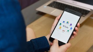 G Suite logo visible on smartphone