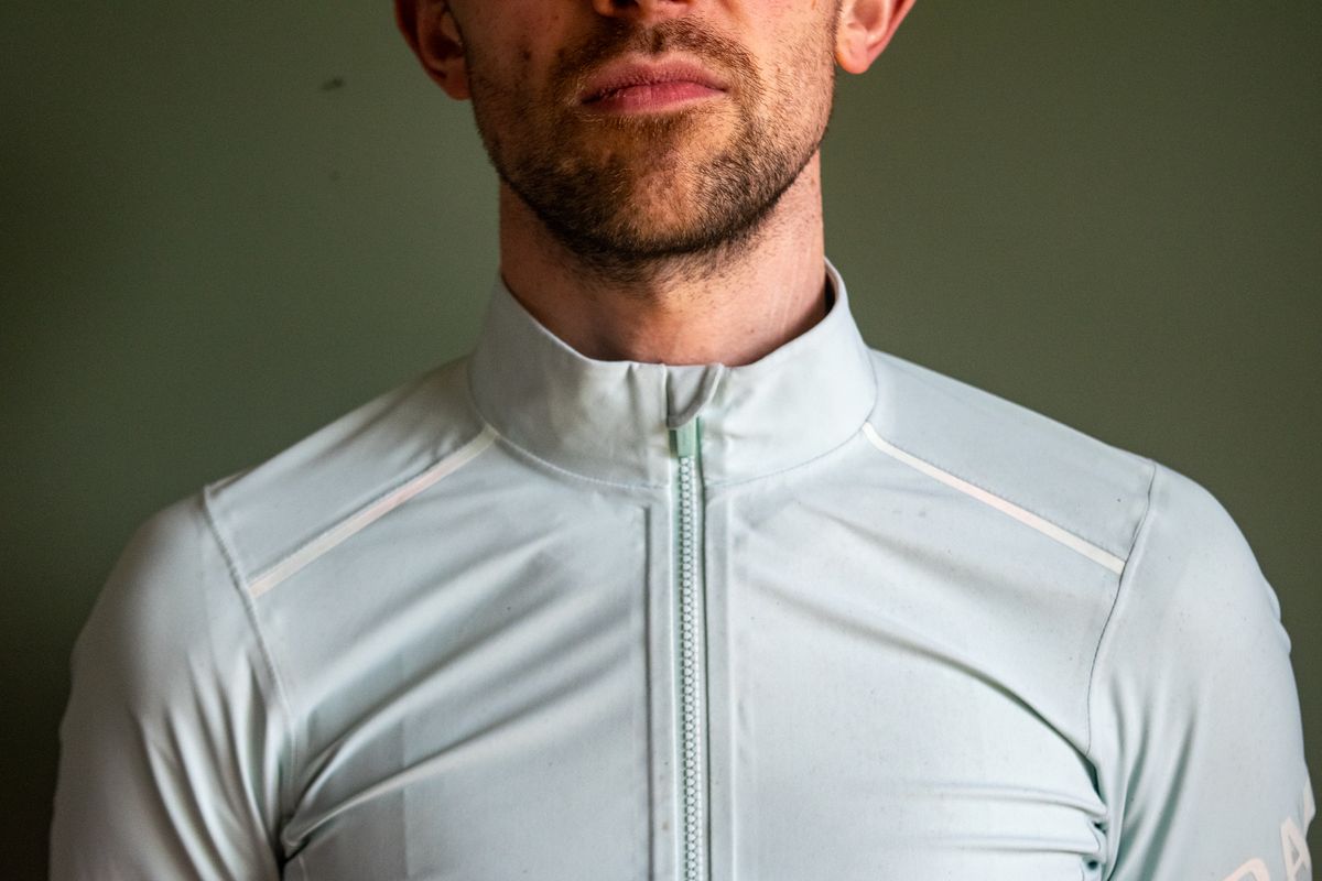 A man wearing a Rapha Shadow jersey