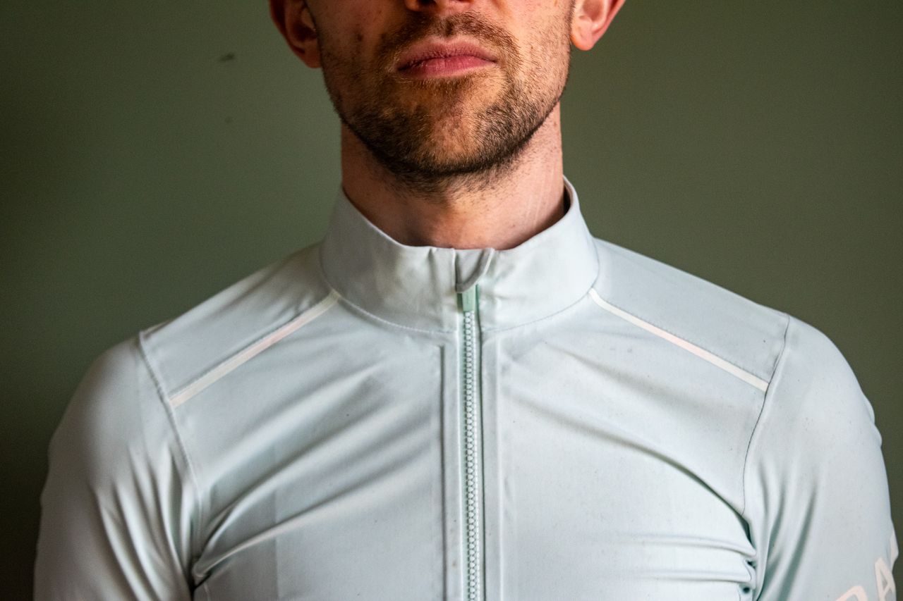 A man wearing a Rapha Shadow jersey