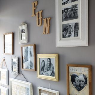hallway with silver wall and photoframe on wall