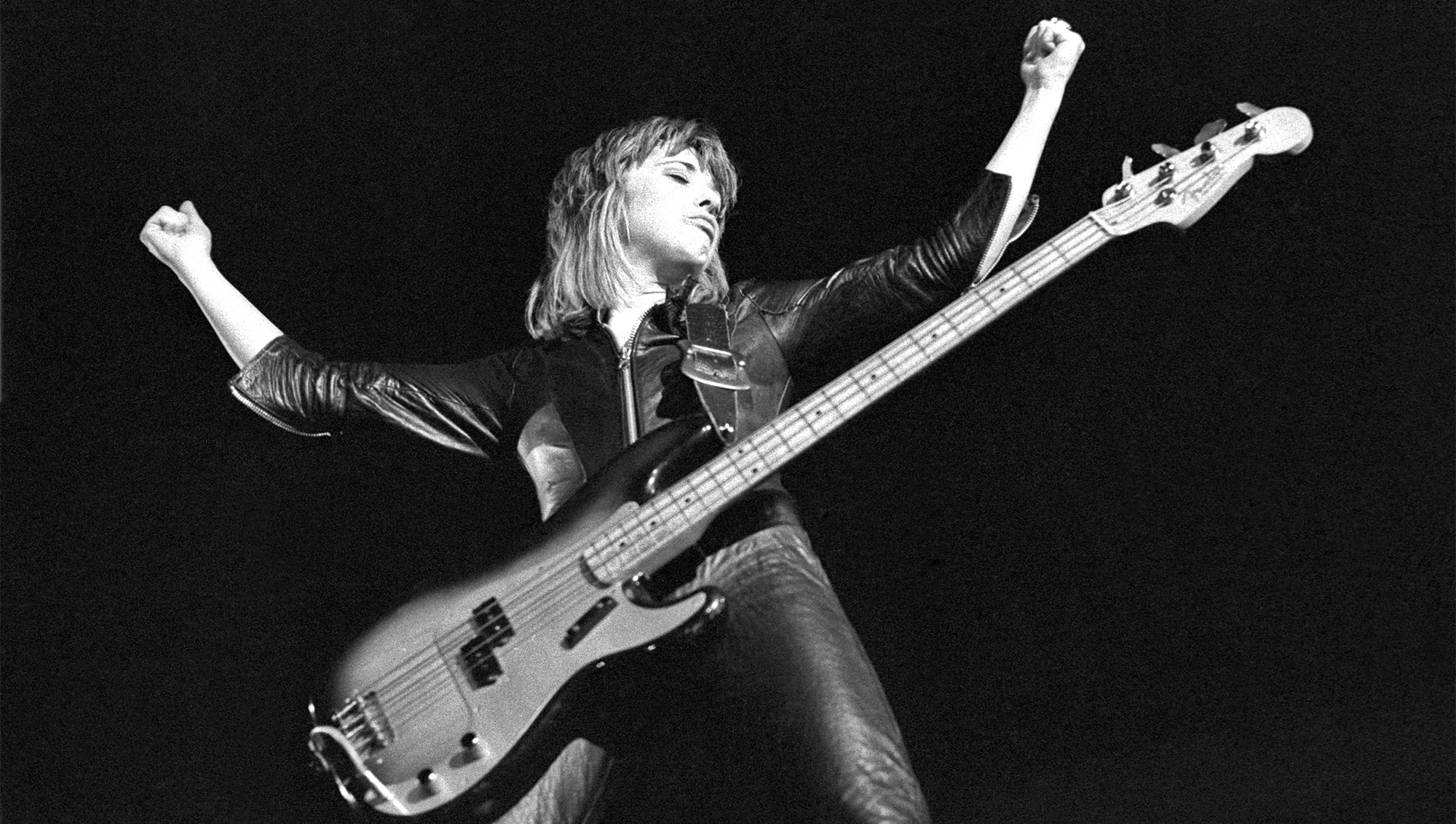 Suzi Quatro performing onstage, United Kingdom, 1974.