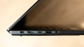 Asus ProArt P16 laptop on a wooden surface