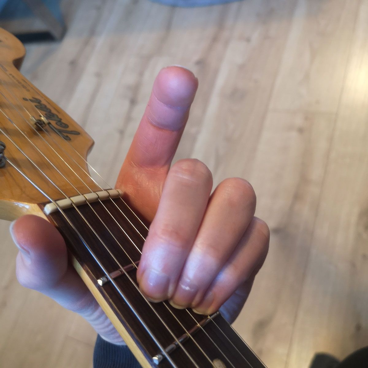 How to play an A chord on guitar: open A