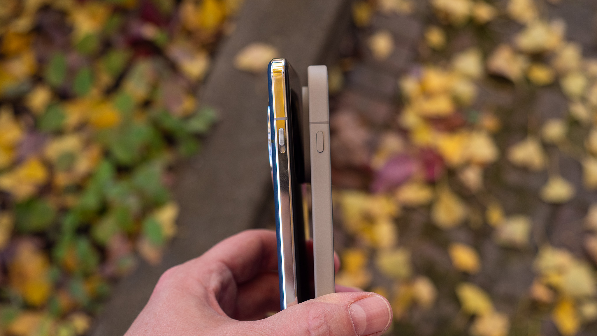 Comparing the Alert Slider on the side of the OnePlus 13 with the Plus Key on the side of the OnePlus 15