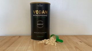 Tub of The Protein Works Vegan Wondershake on a table