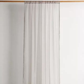 Urban Outfitters Chiffon Window Panel on wooden curtain rod