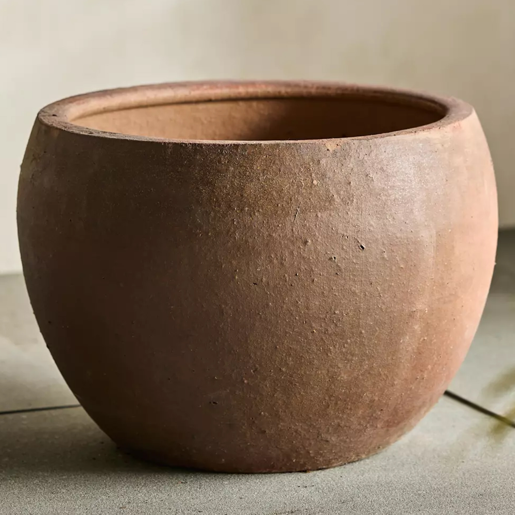 Globe terracotta planter from terrain