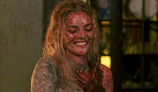 Ready Or Not Grace laughing while covered in blood