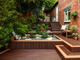 wooden steps, decking by trex and rock garden