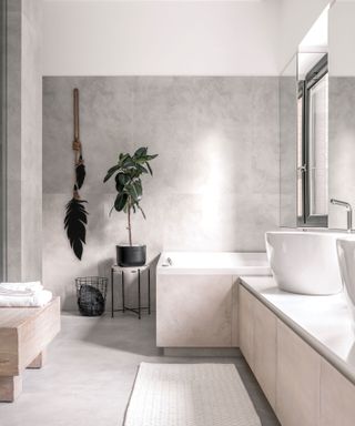 pale neutral bathroom with hanging plants