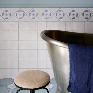 Ca Pietra handpainted tiles on border in bathroom