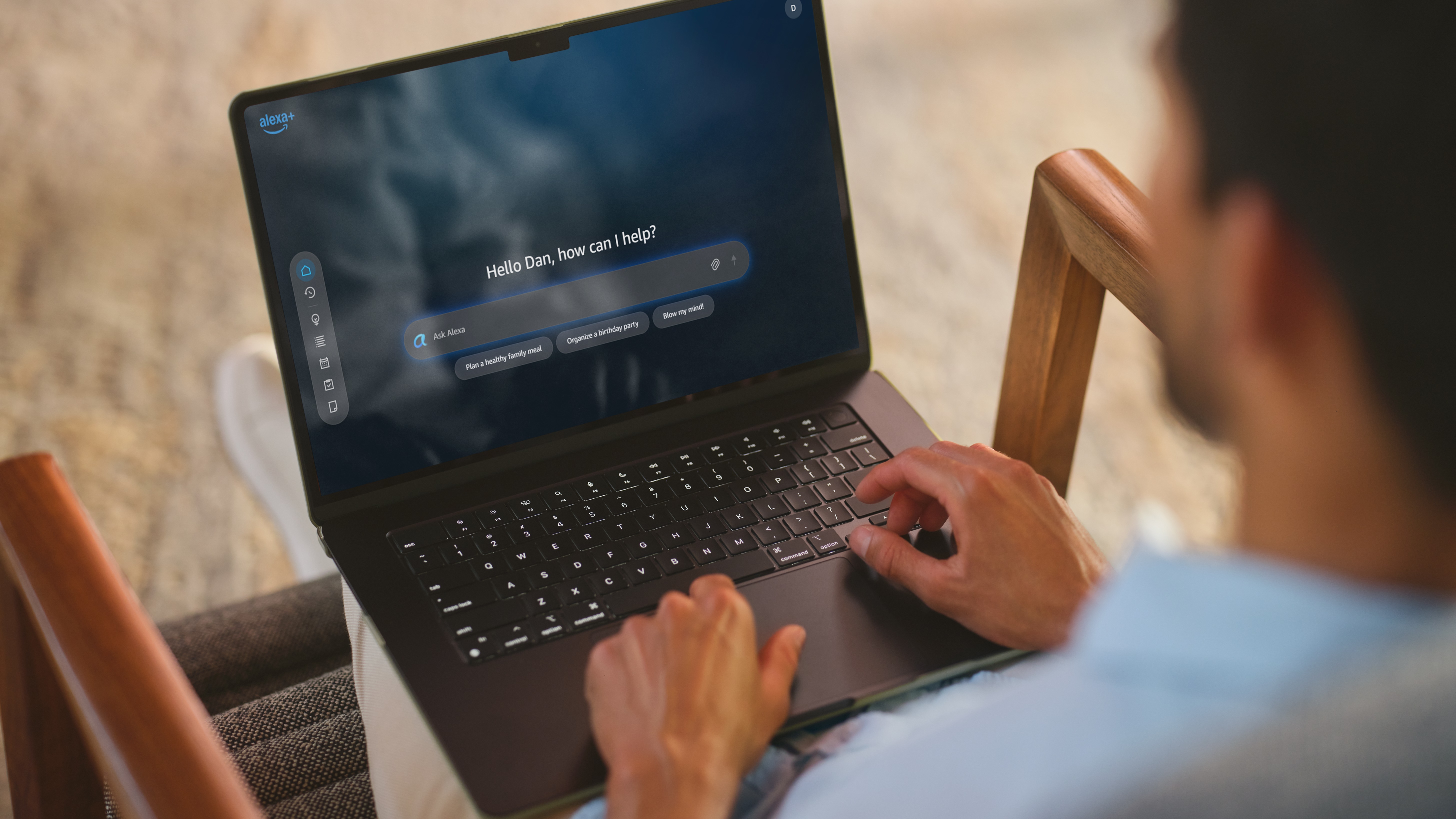 Man using laptop running Amazon Alexa+ in a browser