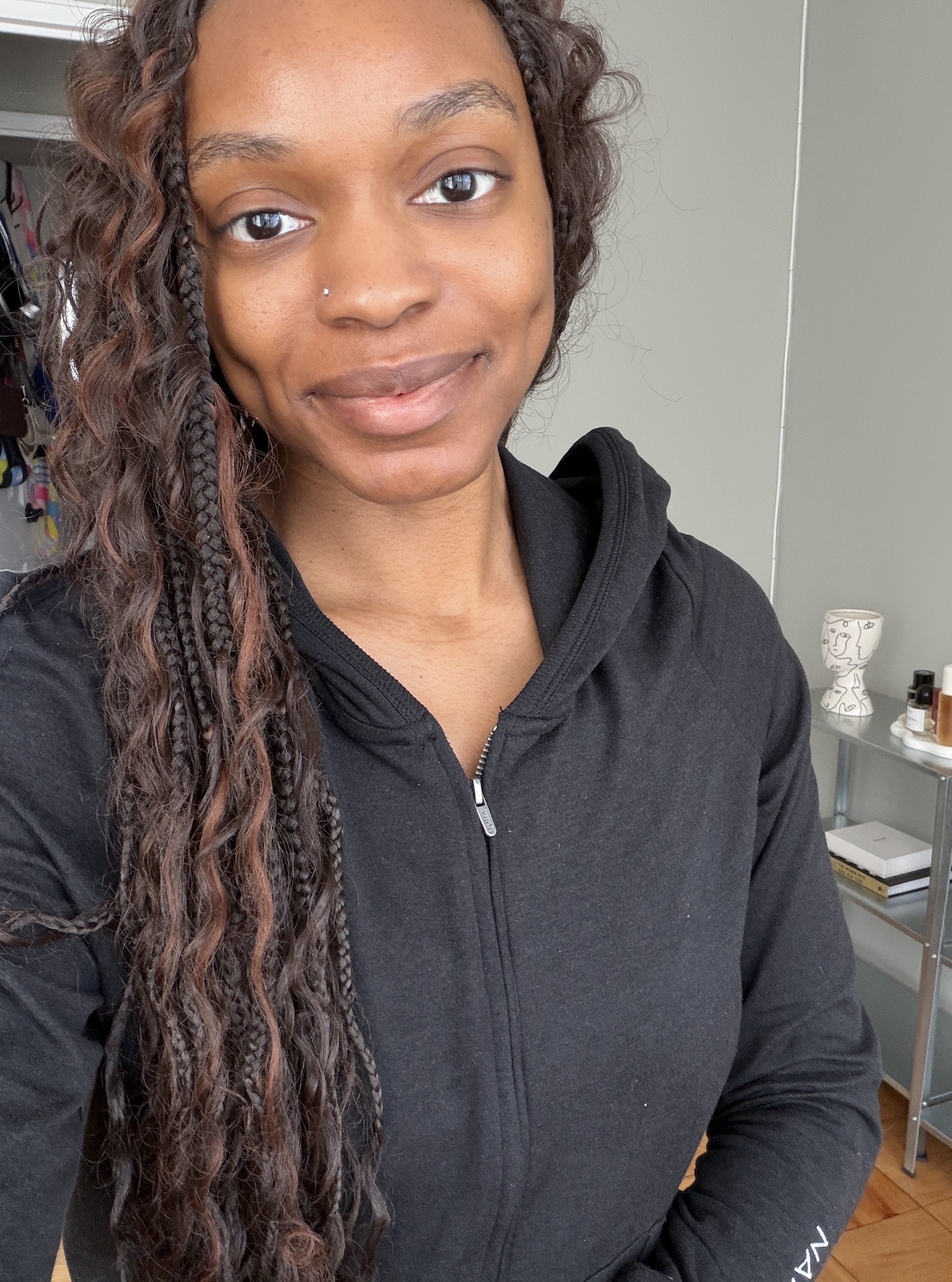 a before image of a woman testing foundation