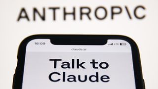 Logo and branding of Anthropic, developer of the Claude 3.5 Sonnet model and other Claude AI model ranges, displayed on a smartphone in foreground with logo blurred in background.