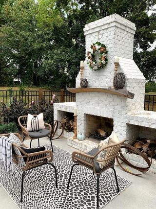 A cosy firepit decorated with candles