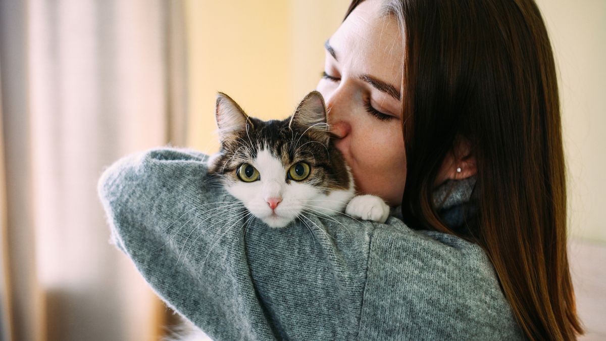 Lady holding cat