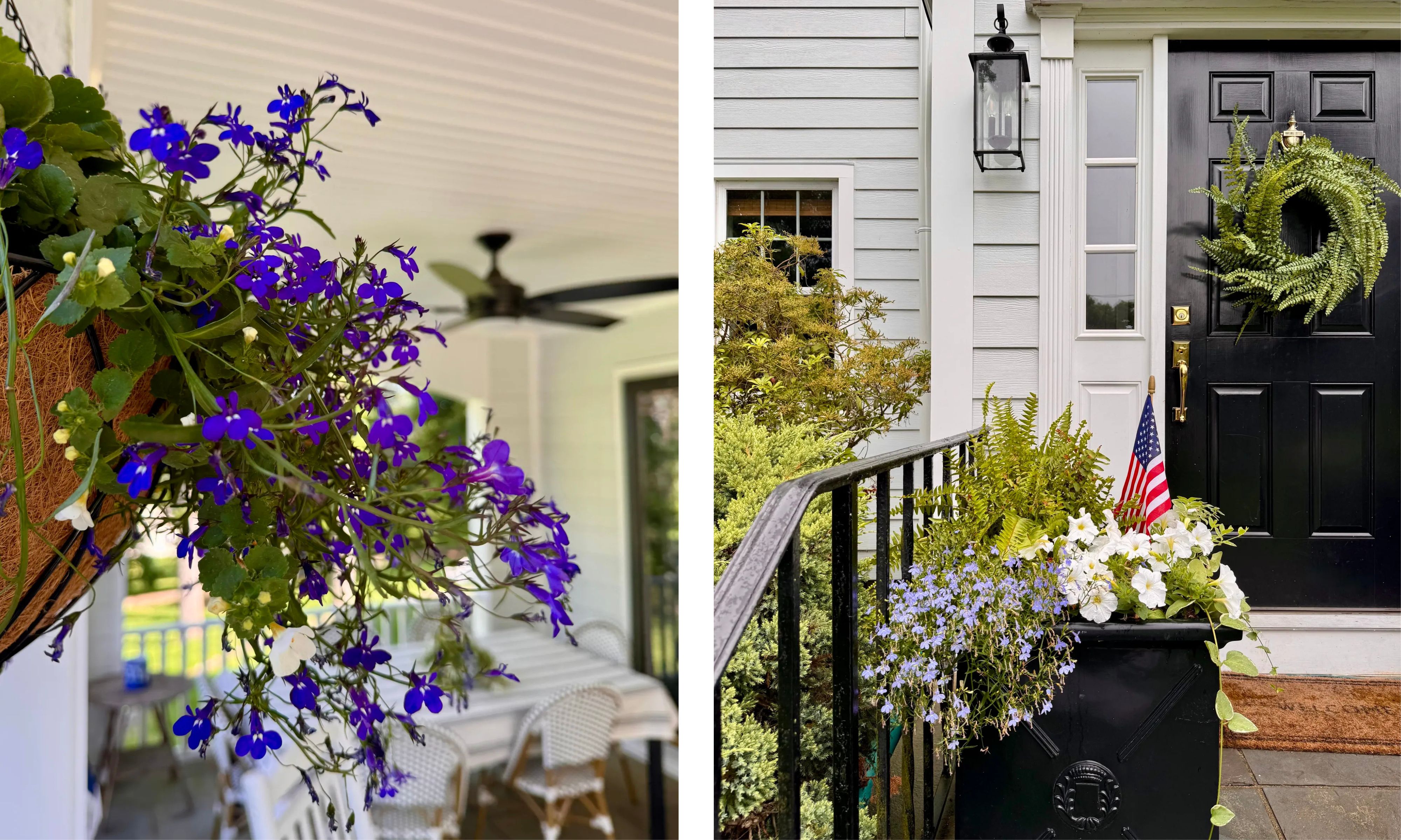 A close-up of purple hanging flowers on a porch on the left; a black front door with a fern wreath and a flower planter with a small American flag on the right.