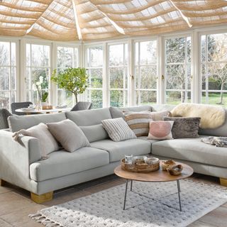 living room ceiling ideas, open plan living/dining space with canopy style blinds from ceiling