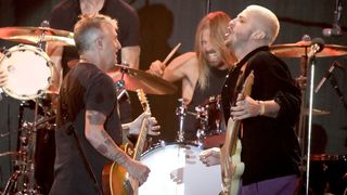 Mike McCready of Pearl Jam performs with Taylor Hawkins and Andrew Watt onstage during the 2021 Ohana Music Festival on October 2, 2021 in Dana Point, California.