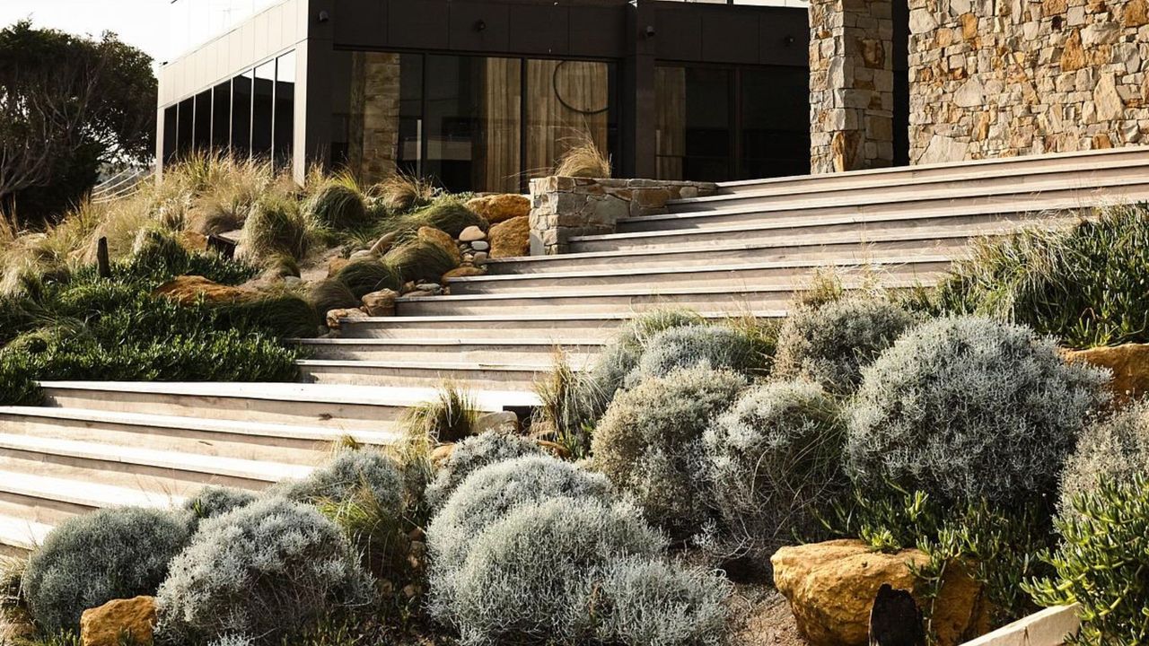 A front yard designed with rocks