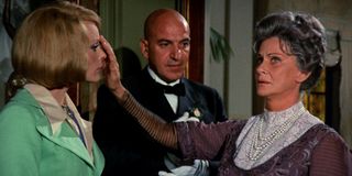 Elke Sommer and Telly Savalas in Lisa and the Devil